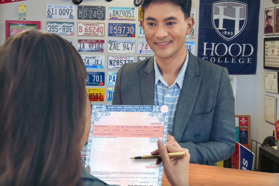 Divirsified Tag and Title Tag Duplicate Title page image of a woman reviewing title with smiling man looking on.