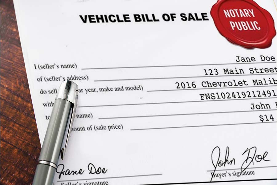 Diversified Tag & Title Notary services image of contract with pen and car fob.